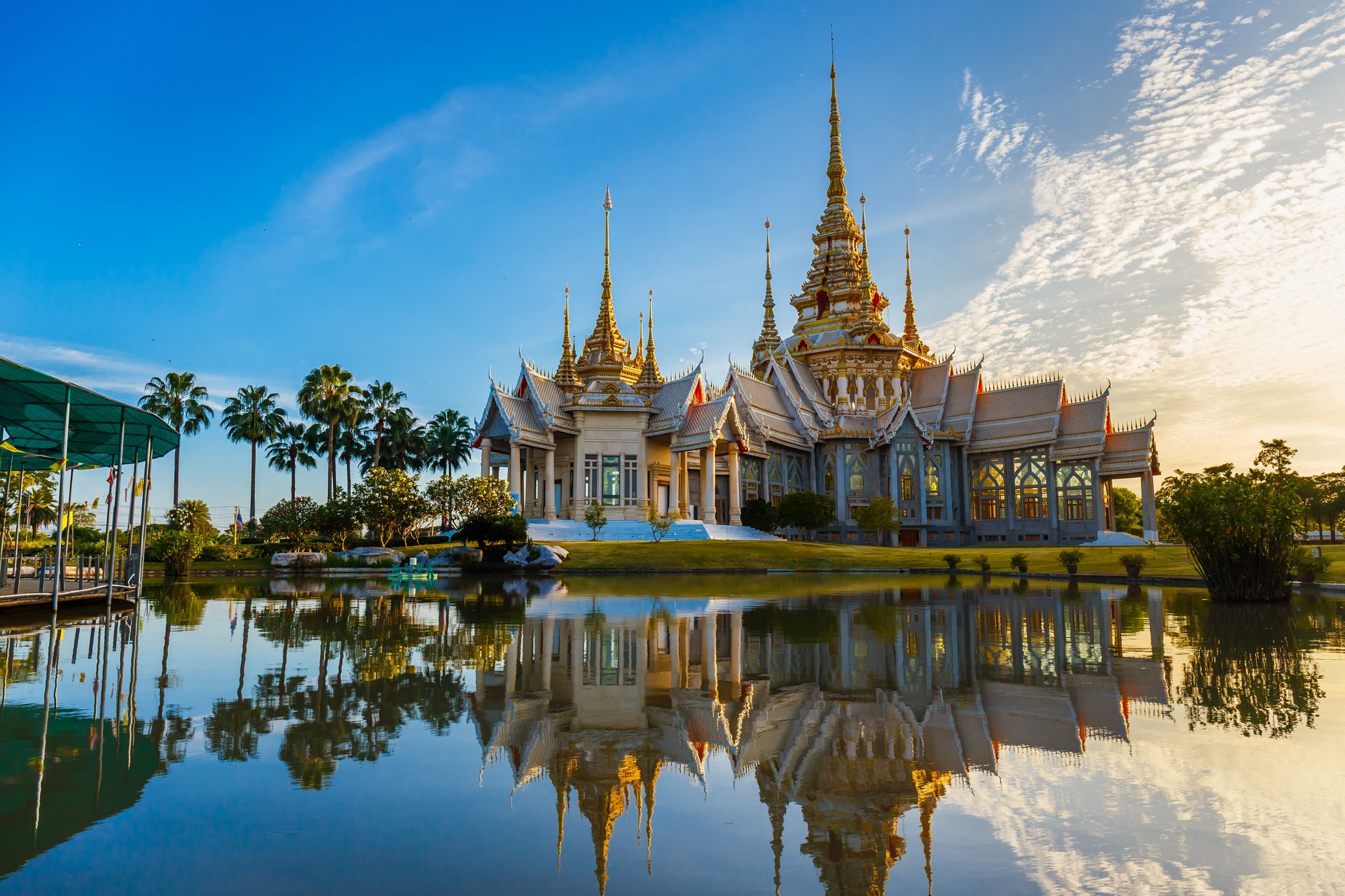 Wat Non Kum or Wat Luang Pho To in Sikhio District, Nakhon Ratchasima, Korat, Thailand is a symbolic place of temples in Thailand. At sunset, there is a reflection in the water.